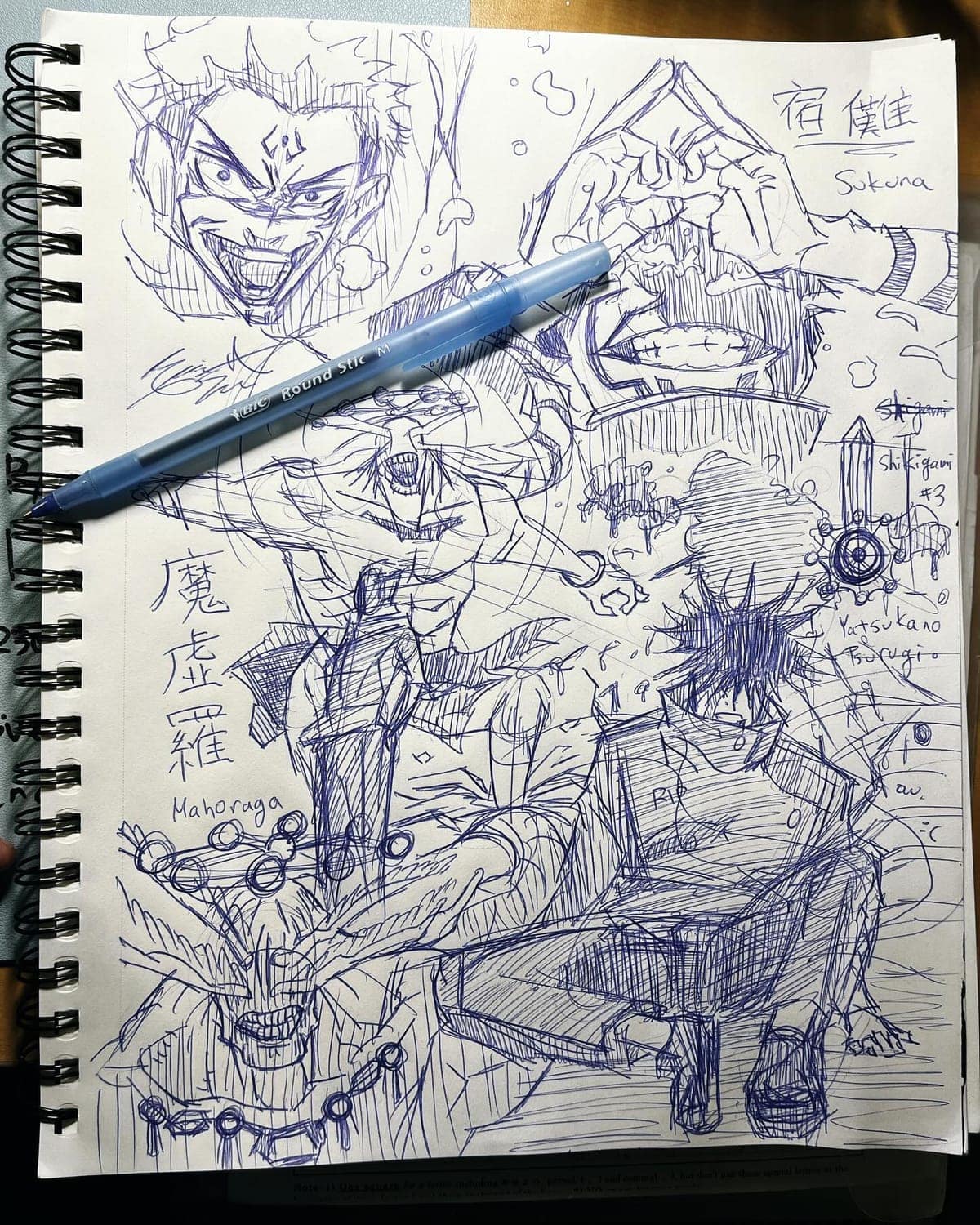 Sketchbook page of blue-pen drawings of Mahoraga and other Jujutsu Kaisen characters